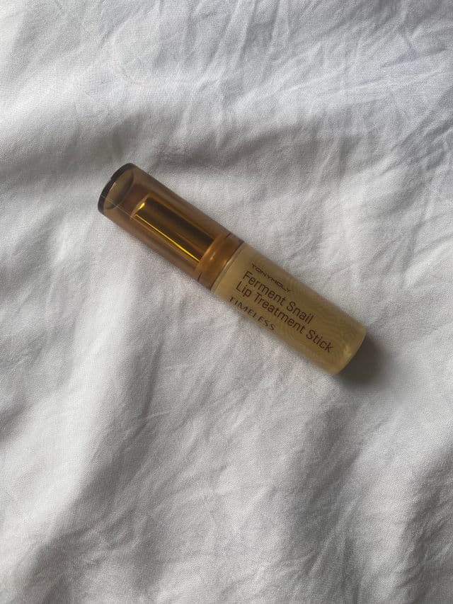 TONYMOLY Intense Care Gold 24K Snail Lip Treatment Stick SPF15 review photo by ale1ra