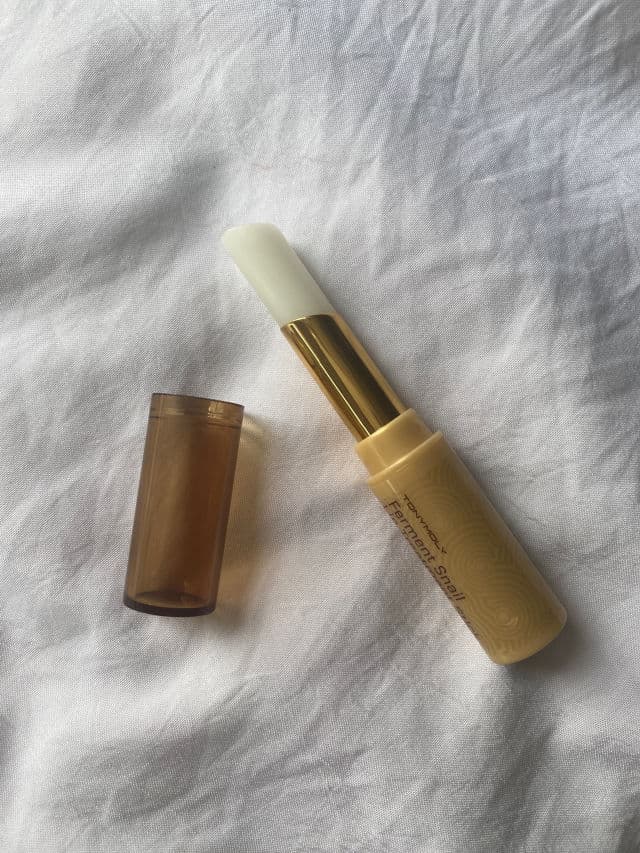 TONYMOLY Intense Care Gold 24K Snail Lip Treatment Stick SPF15 review photo by ale1ra