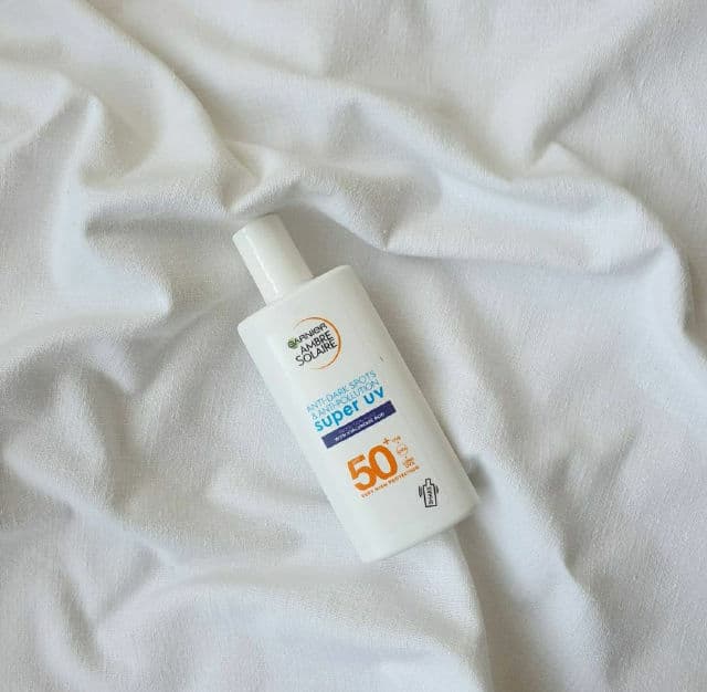 Garnier Ambre Solaire Super UV Anti Dark Spots & Anti Pollution Face Fluid SPF50+ review photo by Skinrelated