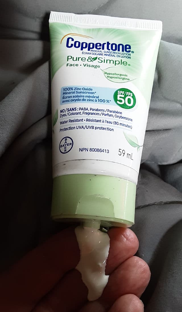 Coppertone Pure & Simple Face Lotion SPF 50 review photo by nicolletiti
